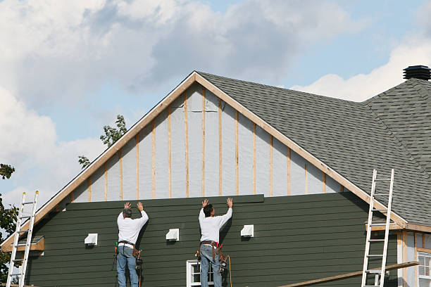 Professional Siding technician working in South Bloomingville, OH